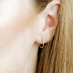 Ava Huggie Infinity Hoop Earrings Silver 10 MM | LINNY CO - Grayce's Boutique