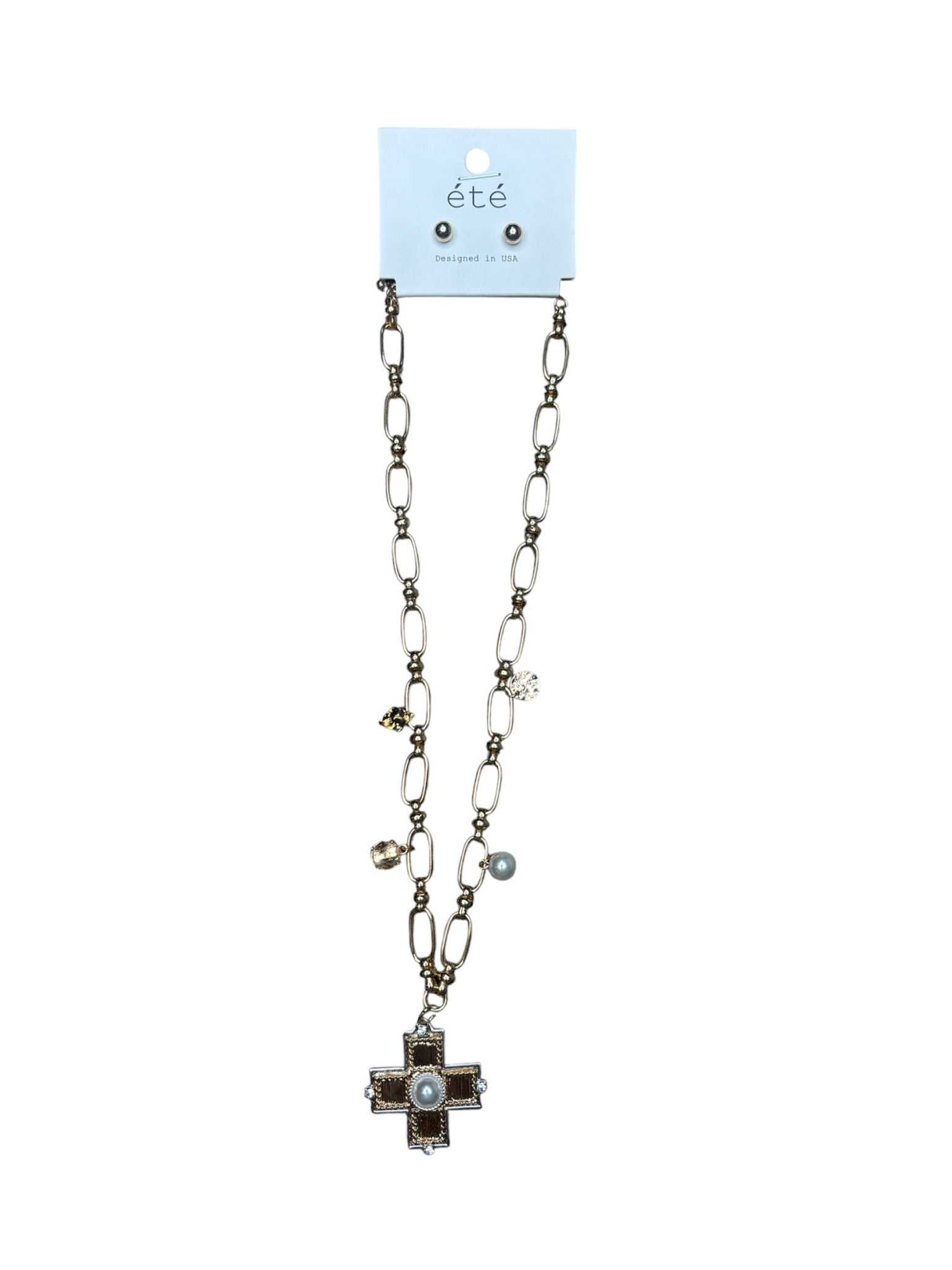 a cross charm necklace.