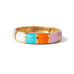 Multicolored bangle with gold band on a white background