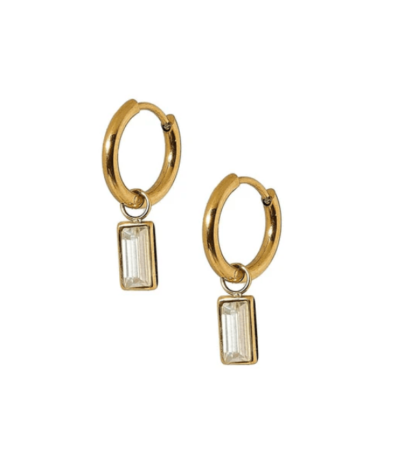 Gold huggie hoop earrings with rectangular gemstones on a white background.