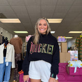 Licensed Black ‘Wicked’ Logo Sweatshirt | Queen of Sparkles - MainStreet Clothing Co.