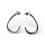 A pair of golden hook earrings.