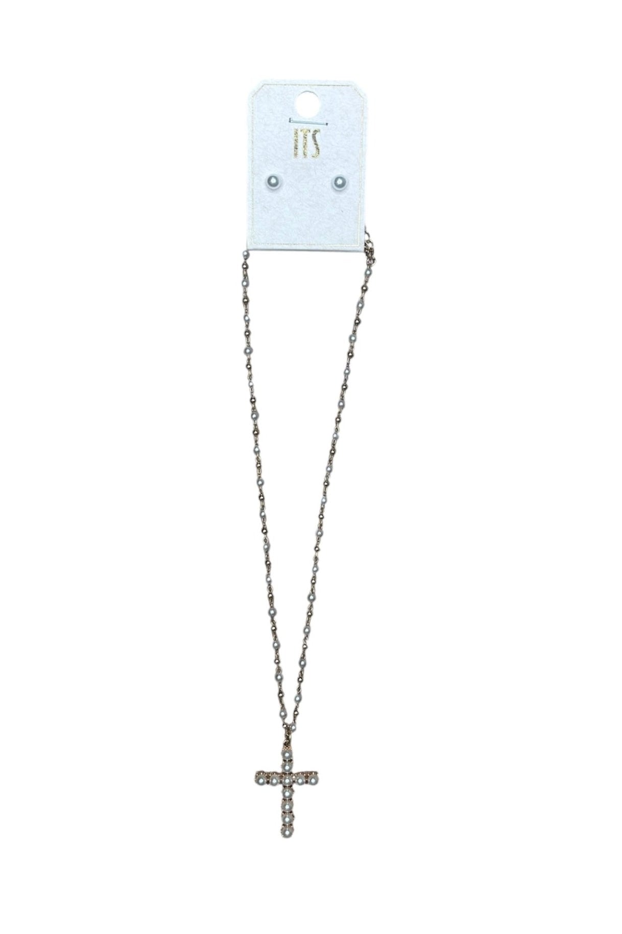 A long gold chain with cross pendant