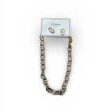 Gold chain necklace and earrings on a white background.