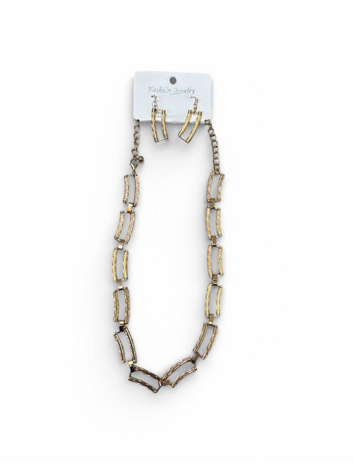 Necklace and earrings set on a white background