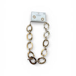 Gold thick chain necklace with a card on a white background